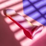 Avant By Blush® | Sun's Out Pink: Artisan 7 Inch Curved P-Spot / G-Spot Dildo with Suction Cup Base - Elegantly Made with Smooth Ultrasilk® Purio™ Silicone